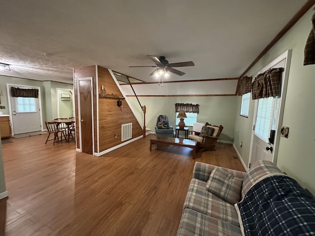 100 Buck Dr, Wellington, KY 40387 - living area with a ceiling fan, wood finished floors, and baseboards
