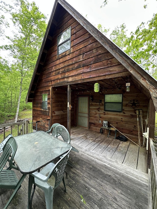 100 Buck Dr, Wellington, KY 40387 - wooden deck with outdoor dining area
