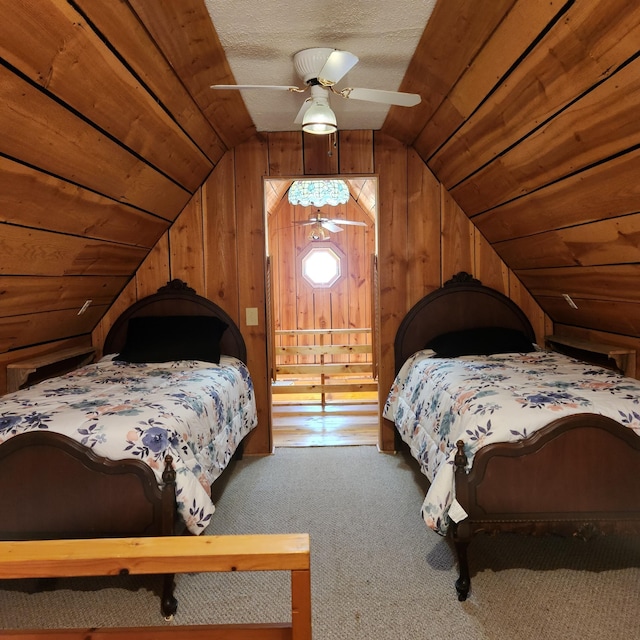 42 Alley Rd, Wellington, KY 40387 - carpeted bedroom featuring vaulted ceiling and wood walls