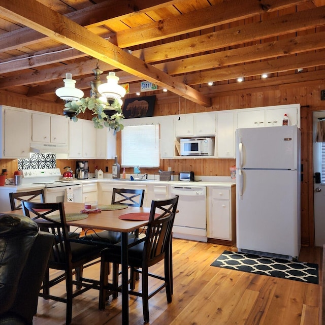 42 Alley Rd, Wellington, KY 40387 - kitchen featuring white appliances, under cabinet range hood, light wood-style flooring, white cabinets, and light countertops