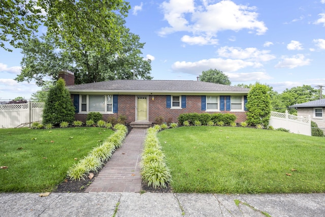 452 Rookwood Pkwy, Lexington, KY 40505 - single story home with brick siding, a chimney, and a shingled roof