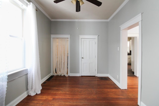 50 Sterling Ave, Fort Thomas, KY 41075 - unfurnished bedroom with wood finished floors, baseboards, crown molding, and a ceiling fan