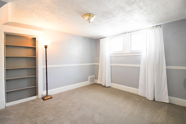 50 Sterling Ave, Fort Thomas, KY 41075 - empty room with a textured ceiling, carpet floors, and baseboards