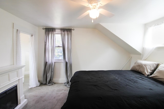 50 Sterling Ave, Fort Thomas, KY 41075 - bedroom with light colored carpet, a fireplace, and a ceiling fan