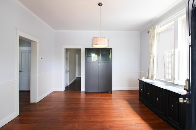 50 Sterling Ave, Fort Thomas, KY 41075 - unfurnished dining area featuring dark wood-style flooring, ornamental molding, and baseboards