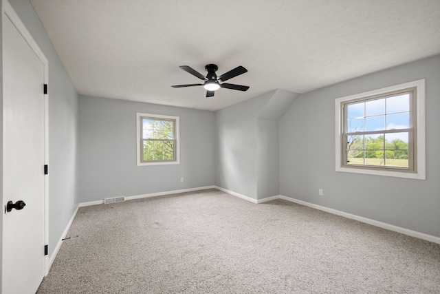 unfurnished bedroom with carpet floors, baseboards, and a ceiling fan
