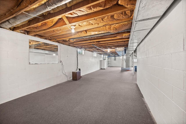 unfinished below grade area featuring gas water heater
