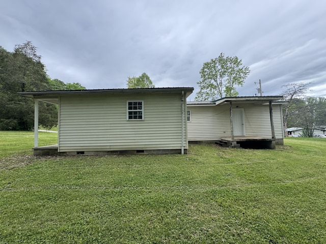357 Powell Rd, Clay City, KY 40312 - rear view of property with crawl space, a yard, and metal roof
