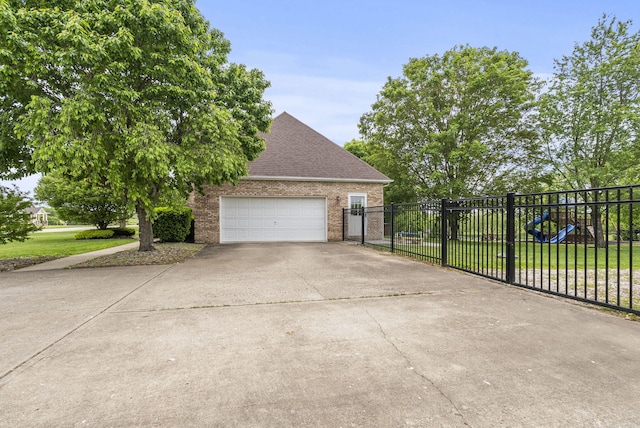 garage featuring driveway