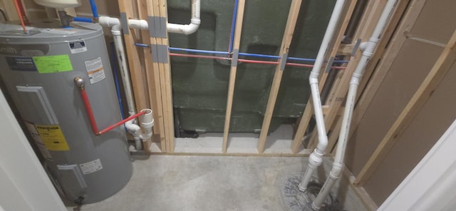 utility room featuring water heater