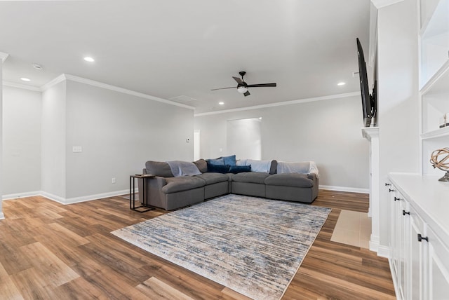 3008 Locust Blossom Cv, Lexington, KY 40511 - living room featuring ceiling fan, wood finished floors, recessed lighting, baseboards, and crown molding