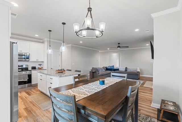 3008 Locust Blossom Cv, Lexington, KY 40511 - dining room featuring a ceiling fan, recessed lighting, light wood finished floors, a chandelier, and ornamental molding