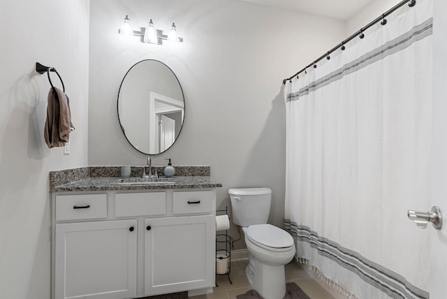 3008 Locust Blossom Cv, Lexington, KY 40511 - bathroom with toilet, tile patterned floors, vanity, and baseboards