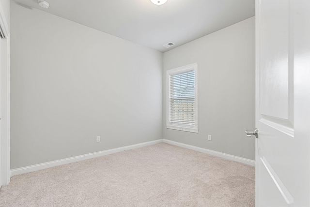 3008 Locust Blossom Cv, Lexington, KY 40511 - spare room featuring light carpet, baseboards, and a smoke detector