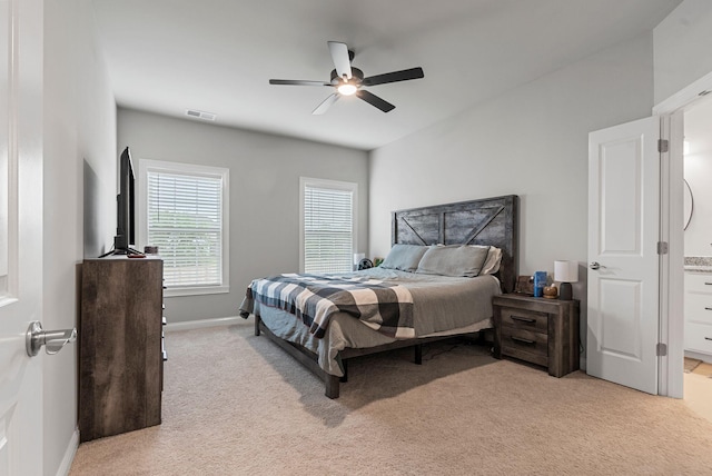 3008 Locust Blossom Cv, Lexington, KY 40511 - bedroom with light carpet, baseboards, a ceiling fan, and ensuite bathroom