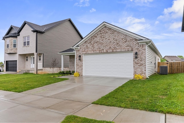 3008 Locust Blossom Cv, Lexington, KY 40511 - view of front facade with central air condition unit, an attached garage, driveway, and brick siding