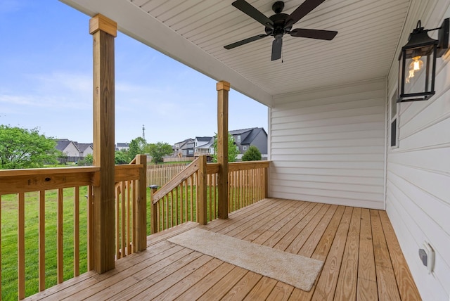 3008 Locust Blossom Cv, Lexington, KY 40511 - wooden deck featuring a ceiling fan, a lawn, and a residential view