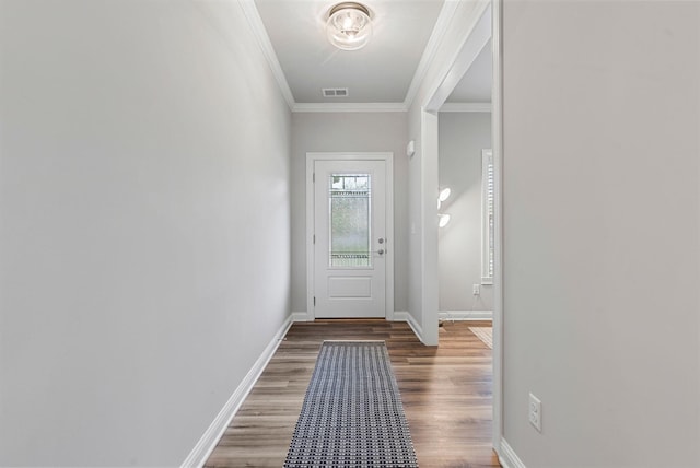 3008 Locust Blossom Cv, Lexington, KY 40511 - entryway featuring wood finished floors, ornamental molding, and baseboards