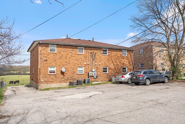 1517 Steadmantown Ln, Frankfort, KY 40601 - rear view of property with brick siding and cooling unit