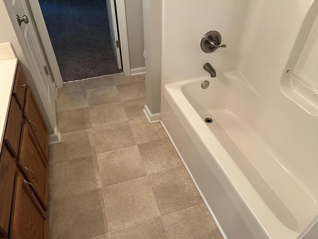 1204 Red Stone Dr, Lexington, KY 40509 - bathroom featuring baseboards, vanity, and bathing tub / shower combination