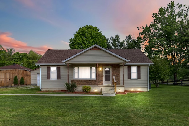 view of front of home with a shingled roof and a porch