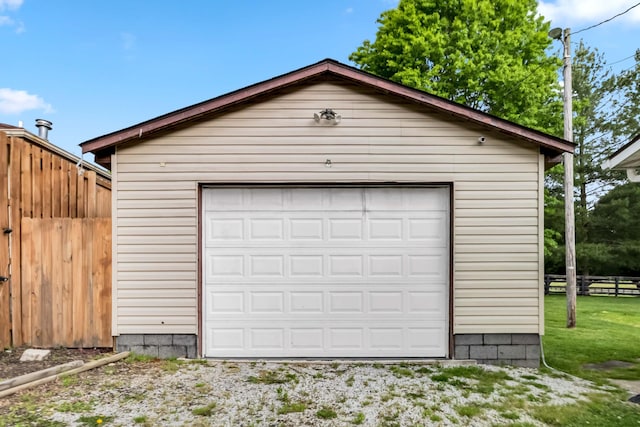 detached garage with fence