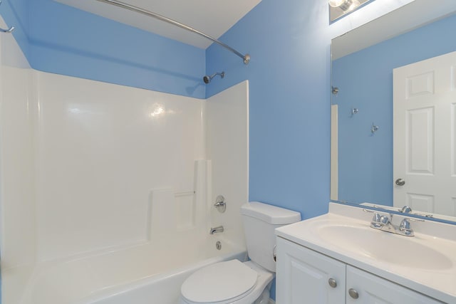 full bath with toilet, vanity, and shower / tub combination