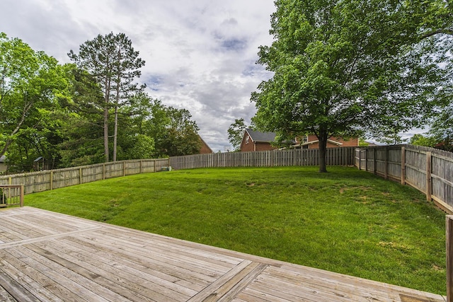 view of yard with a wooden deck