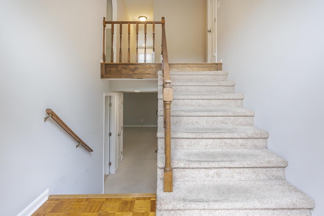 staircase with baseboards