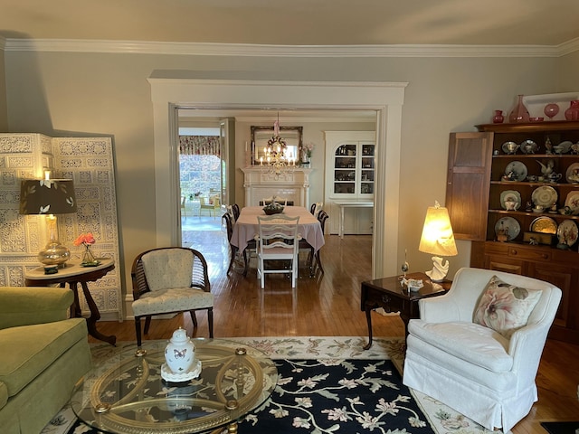 218 W Campbell St, Frankfort, KY 40601 - living room featuring a chandelier, ornamental molding, wood finished floors, and baseboards