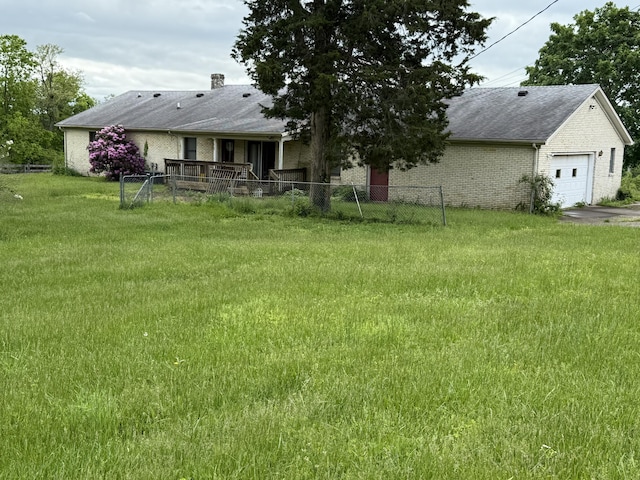 8023 Old Richmond Rd, Lexington, KY 40515 - view of yard featuring an attached garage