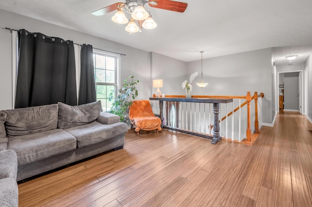 501 Ashley Ct, Berea, KY 40403 - living area with wood finished floors, ceiling fan, and baseboards