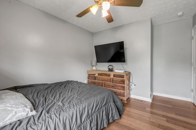 501 Ashley Ct, Berea, KY 40403 - bedroom featuring wood finished floors, baseboards, a ceiling fan, and a textured ceiling