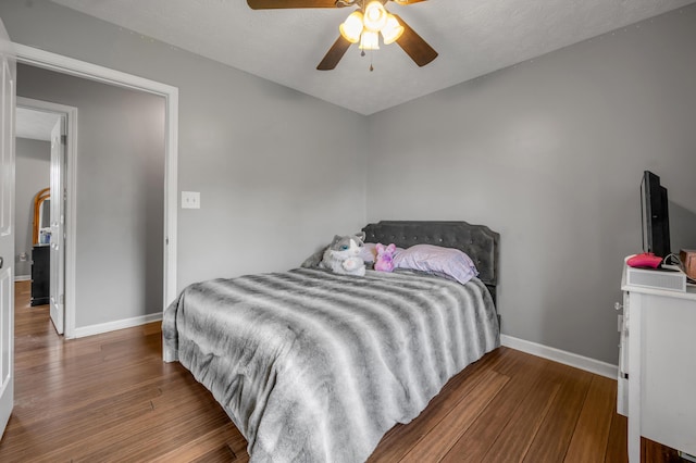 501 Ashley Ct, Berea, KY 40403 - bedroom featuring baseboards, wood finished floors, and a ceiling fan