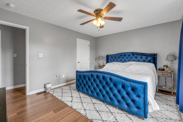 501 Ashley Ct, Berea, KY 40403 - bedroom with wood finished floors, baseboards, and a ceiling fan