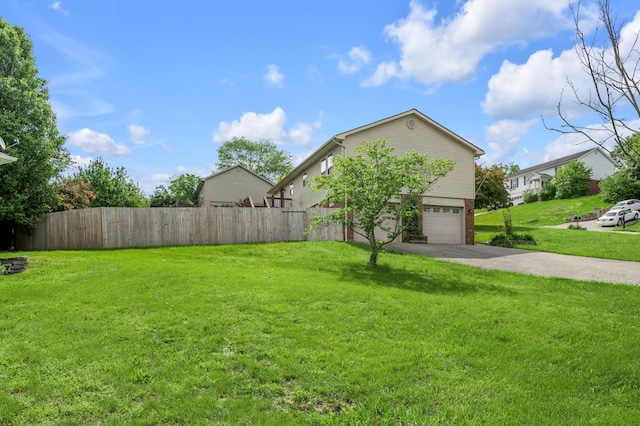 501 Ashley Ct, Berea, KY 40403 - view of yard featuring asphalt driveway and a garage