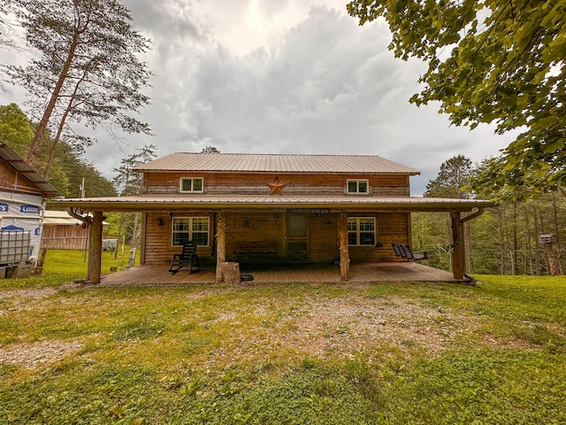 1388 Dog Branch Rd, London, KY 40741 - back of property with a yard and metal roof
