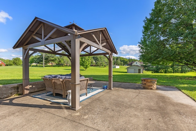 view of patio featuring an outdoor structure and a gazebo