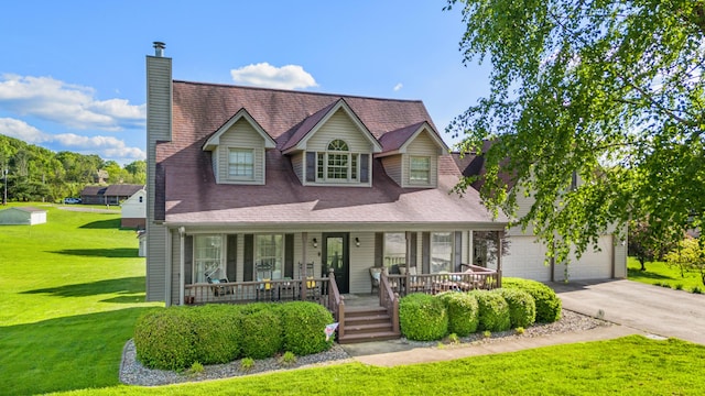 cape cod home with a porch, a front yard, driveway, a chimney, and roof with shingles