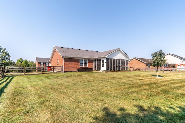 129 General Cleburne Dr, Richmond, KY 40475 - back of house with a sunroom and brick siding