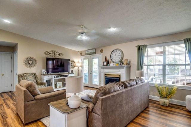 129 General Cleburne Dr, Richmond, KY 40475 - living area featuring wood finished floors, a ceiling fan, a textured ceiling, french doors, and baseboards
