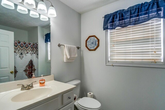 129 General Cleburne Dr, Richmond, KY 40475 - bathroom with toilet, vanity, and a shower with shower curtain