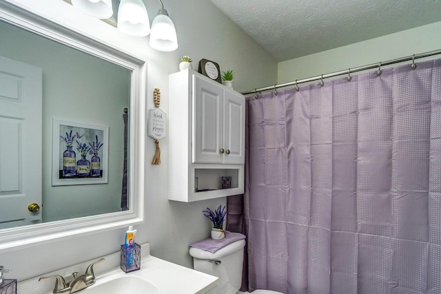 129 General Cleburne Dr, Richmond, KY 40475 - bathroom featuring toilet, vanity, a textured ceiling, and curtained shower