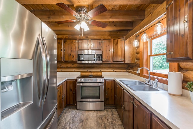 134 Pandora Dr, Harrodsburg, KY 40330 - kitchen featuring stainless steel appliances, a sink, wood ceiling, light countertops, and log walls