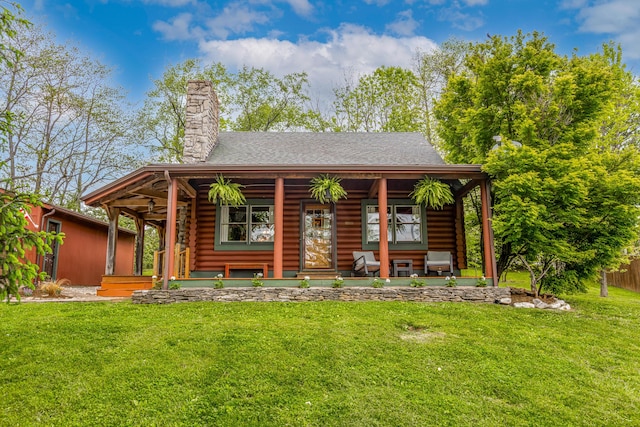 134 Pandora Dr, Harrodsburg, KY 40330 - view of front of home featuring log siding, a porch, a front lawn, a chimney, and a shingled roof