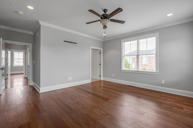 unfurnished room with ceiling fan, baseboards, dark wood finished floors, ornamental molding, and recessed lighting