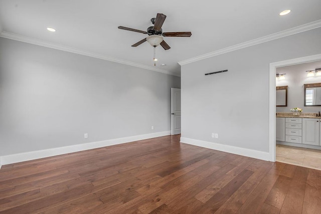 unfurnished bedroom featuring light wood finished floors, baseboards, crown molding, recessed lighting, and a ceiling fan