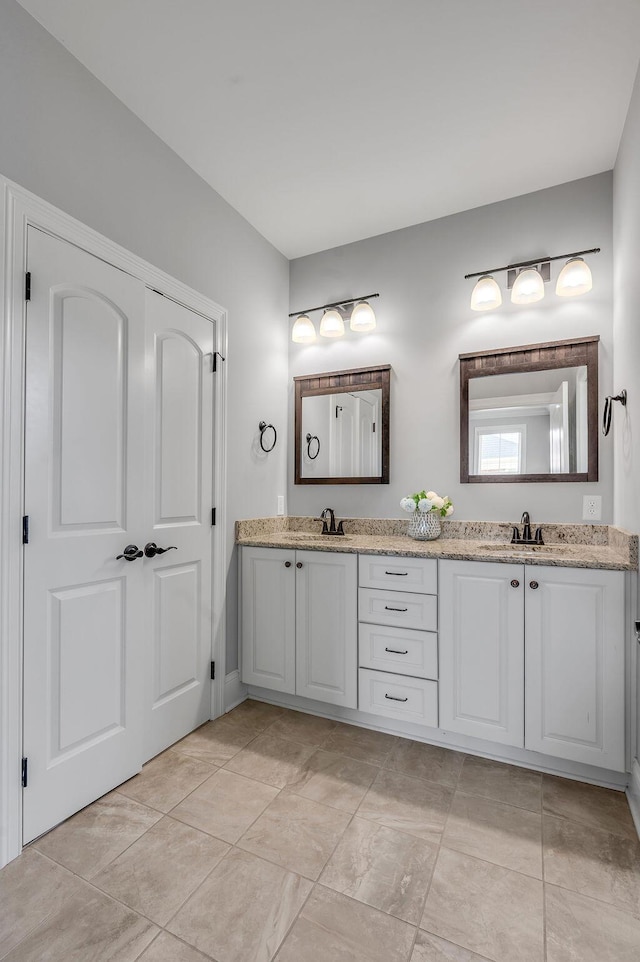 full bathroom featuring double vanity