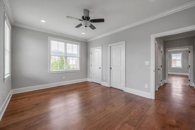 unfurnished bedroom with ornamental molding, baseboards, dark wood-style floors, and recessed lighting