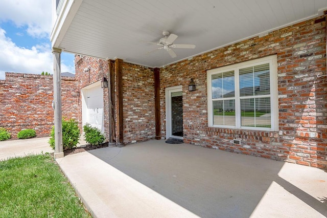 view of patio featuring ceiling fan